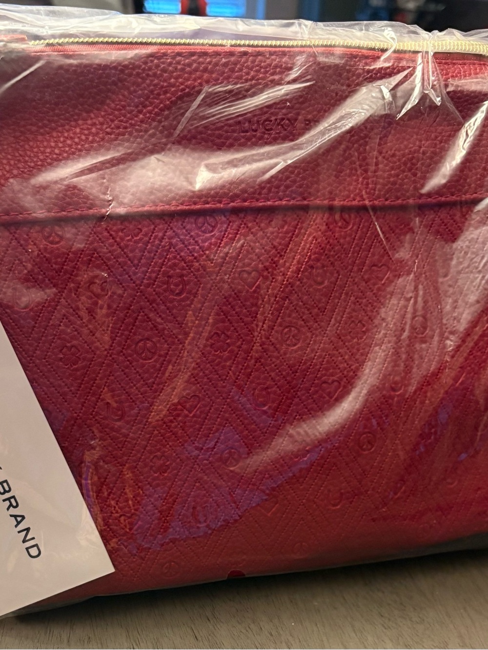 Lucky Brand Red Embossed Cosmetic Pouch with Gold Zip